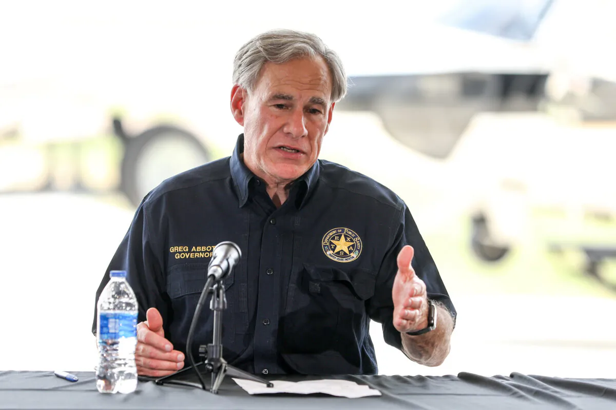 Texas Gov. Greg Abbott speaks during a border meeting in Del Rio, Texas, on July 18, 2021. (Charlotte Cuthbertson/The Epoch Times)