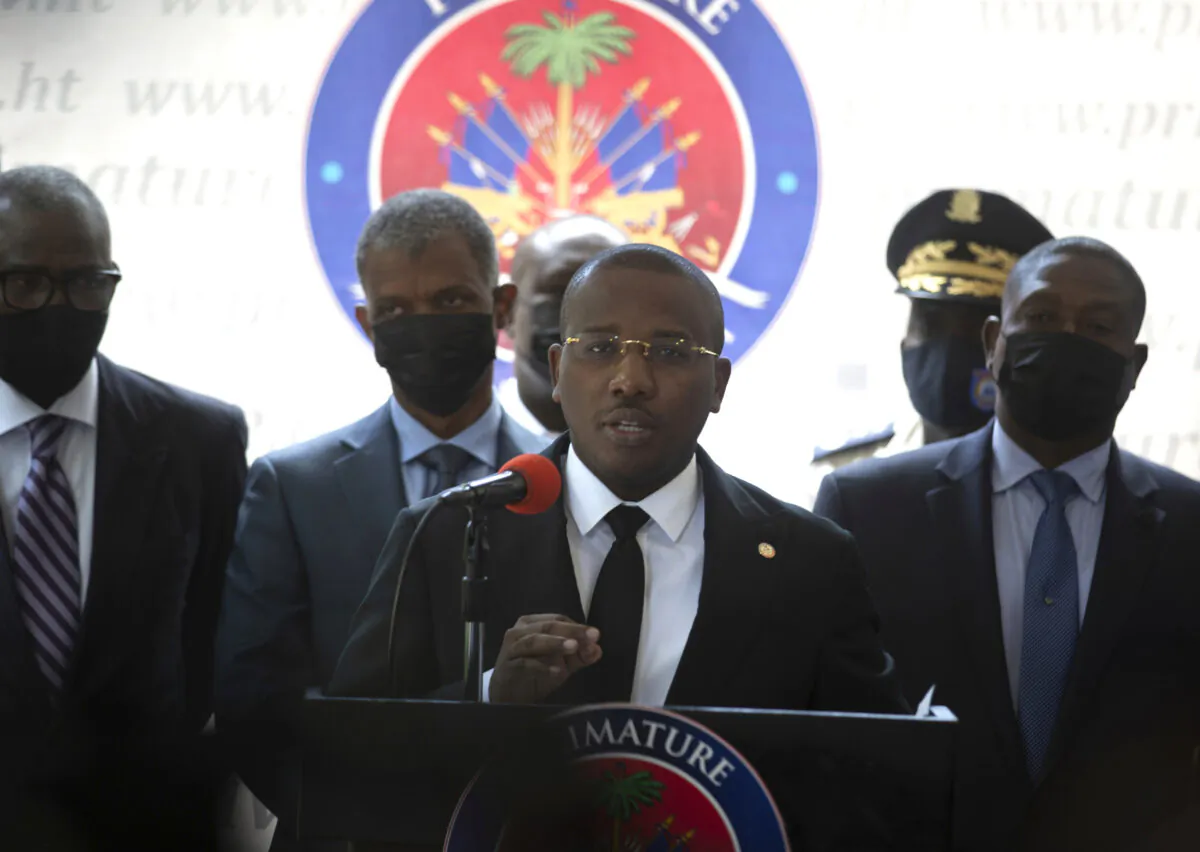 Haiti's interim Prime Minister Claude Joseph gives a press conference in Port-au-Prince, on Friday, July 16, 2021. (AP Photo/Joseph Odelyn)
