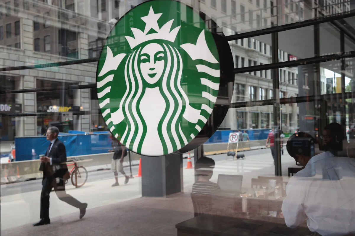 A sign hangs in the window of a Starbucks store in Chicago, Ill., on May 29, 2018. (Scott Olson/Getty Images)