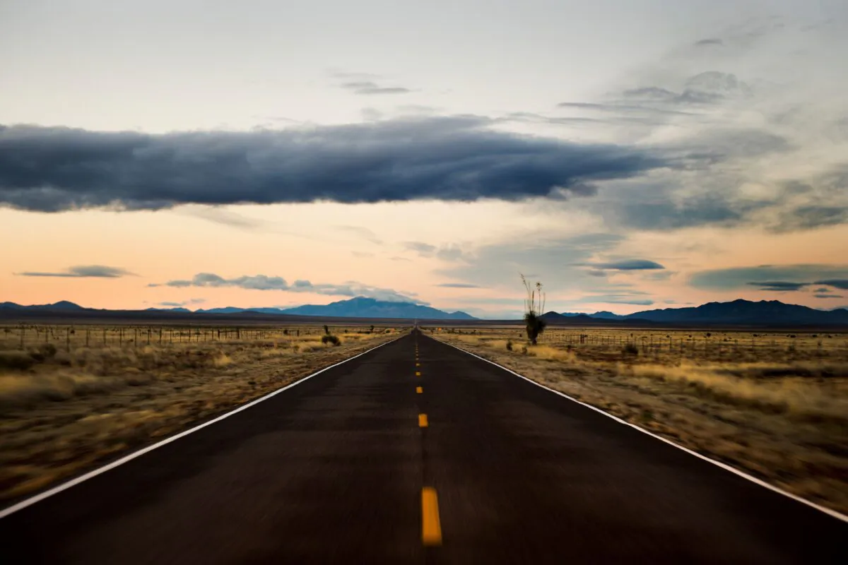 The sun begins to rise on Country Road B002 outside Columbus, N.M., on Feb. 19, 2017. (Jim Watson/AFP via Getty Images)