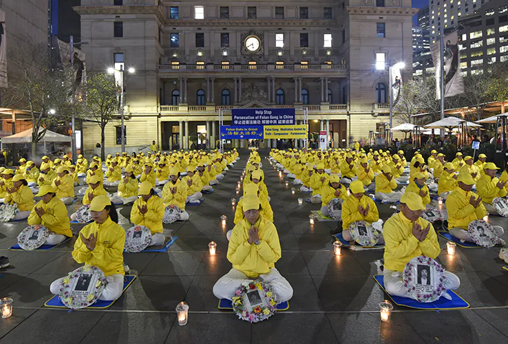 Falun Dafa practitioners commemorate lives lost and 20 years of persecution by the Chinese communist regime in Sydney, Australia, on July 19, 2019. (The Epoch Times)