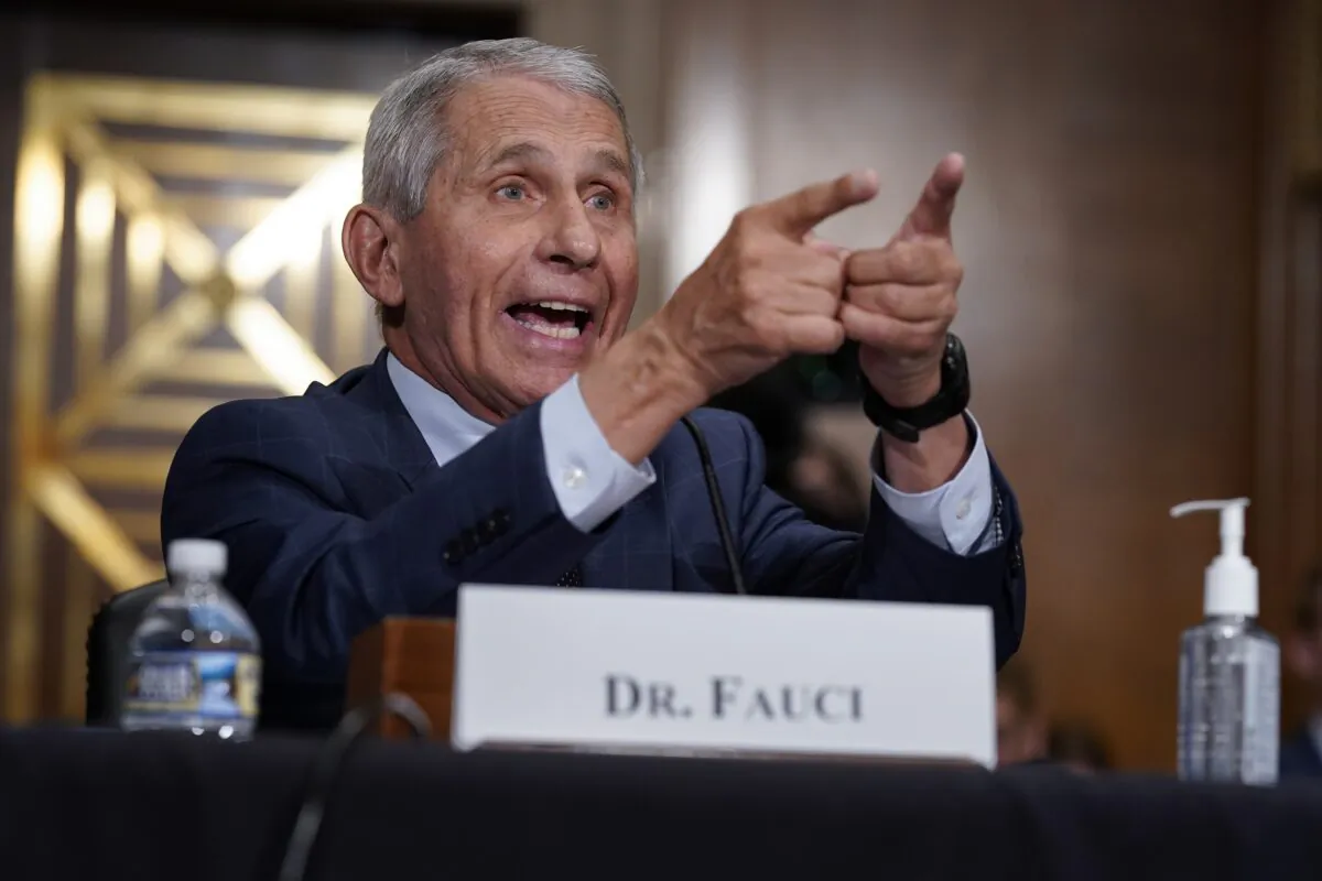 Dr. Anthony Fauci, the head of the National Institute of Allergy and Infectious Diseases, responds to Sen. Rand Paul (R-Ky.) during a congressional hearing in Washington on June 20, 2021. (J. Scott Applewhite/Pool/Getty Images)