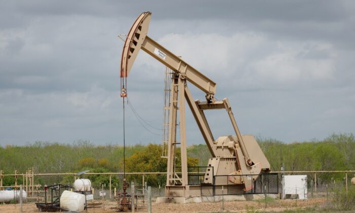 A pump jack is seen at an oil extraction site in Cotulla, Texas, on March 12, 2019. (Loren Elliott/AFP via Getty Images)