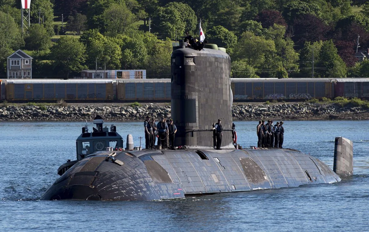 HMCS Windsor, one of Canada's Victoria-class long-range patrol submarines, returns to port in Halifax on June 20, 2018, after completing a five-month deployment in the Euro-Atlantic region to conduct training exercises with other navies and international security partners. (The Canadian Press/Andrew Vaughan)