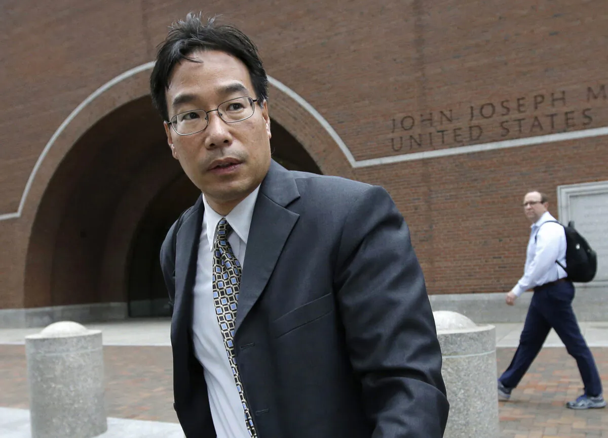 Glenn Chin, a supervisory pharmacist at the now-closed New England Compounding Center, leaves federal court after attending the first day of his trial in Boston on Sept. 19, 2017. (Steven Senne/AP Photo)