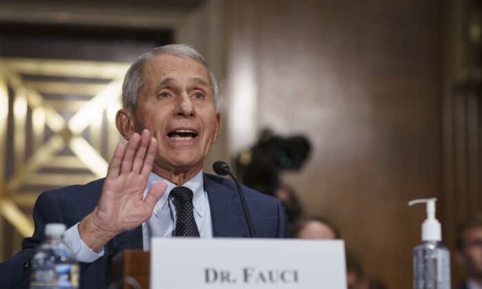 Dr. Anthony Fauci pushes back on statements by Sen. Rand Paul (R-Ky.) during a hearing on Capitol Hill in Washington, on July 20, 2021. (J. Scott Applewhite/Pool/AP Photo)