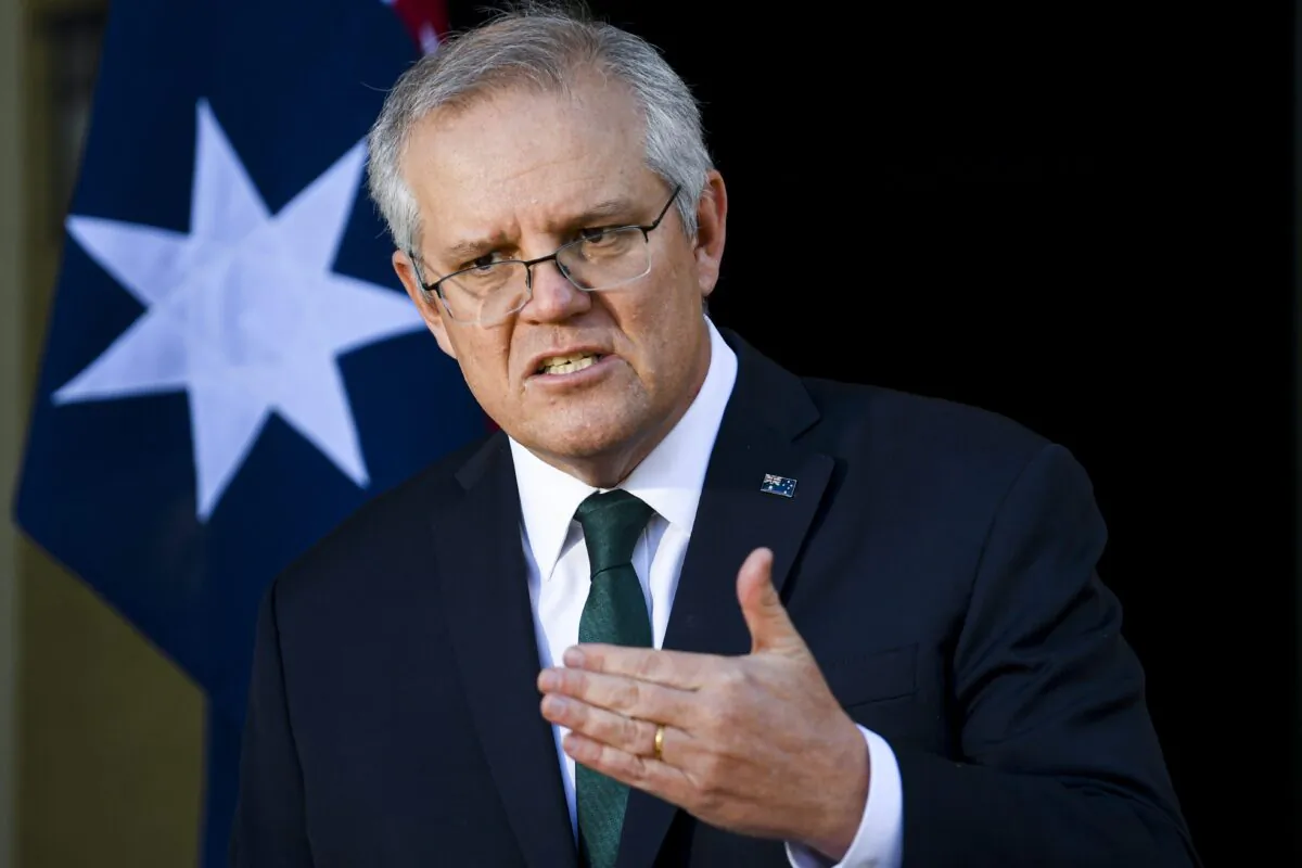 Australian Prime Minister Scott Morrison speaks to the media during a press conference at the Lodge in Canberra, Australia, on July 21, 2021. (AAP Image/Lukas Coch)