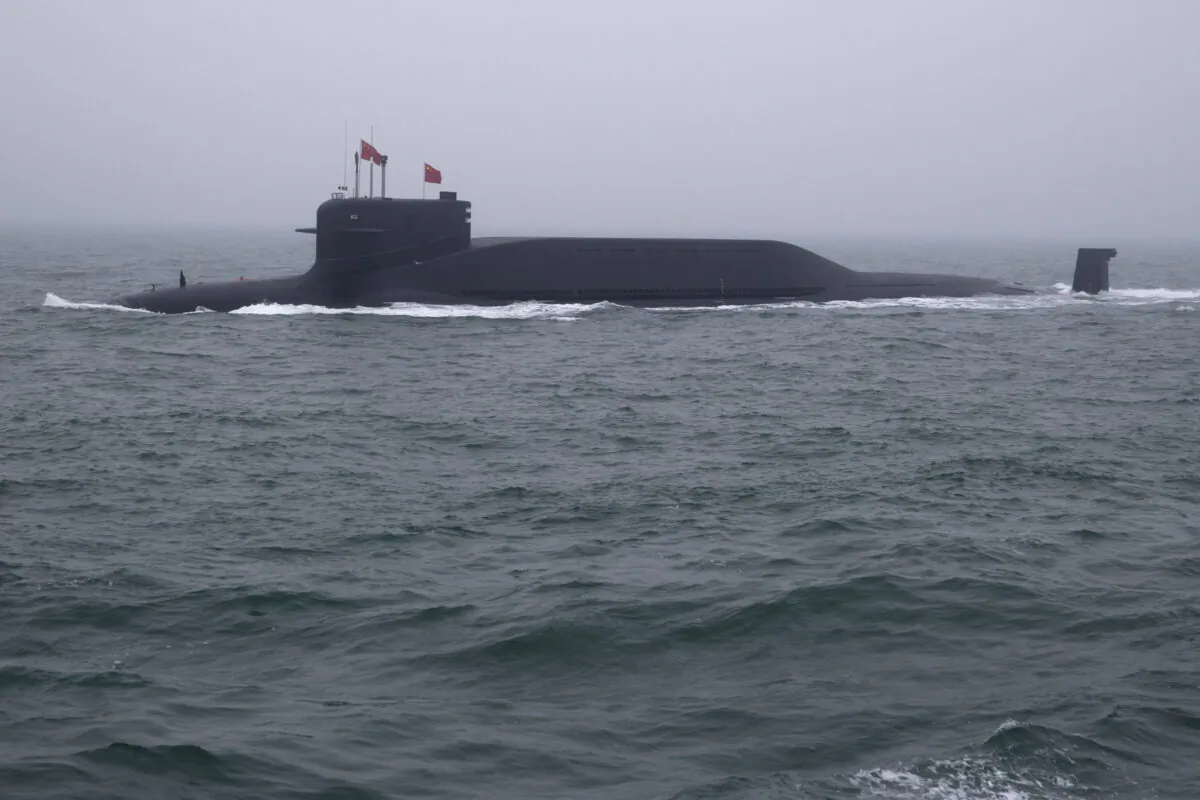 A type 094 Jin-class nuclear submarine Long March 15 of Chinese Navy participates in a naval parade in the sea near Qingdao, in eastern China's Shandong Province on April 23, 2019. (Mark Schiefelnein/AFP via Getty Images)