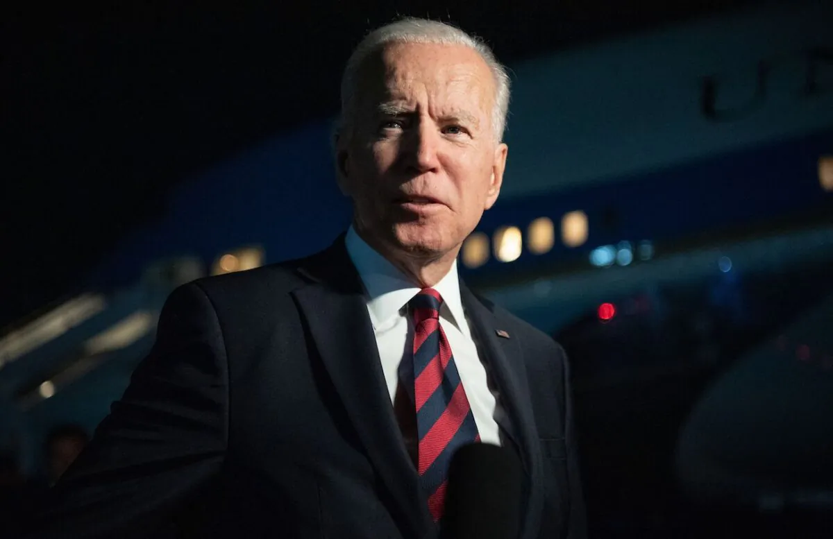 President Joe Biden speaks to the media prior to boarding Air Force One departing from Cincinnati Northern Kentucky International Airport in Hebron, Ky., on July 21, 2021. (Saul Loen/AFP via Getty Images)