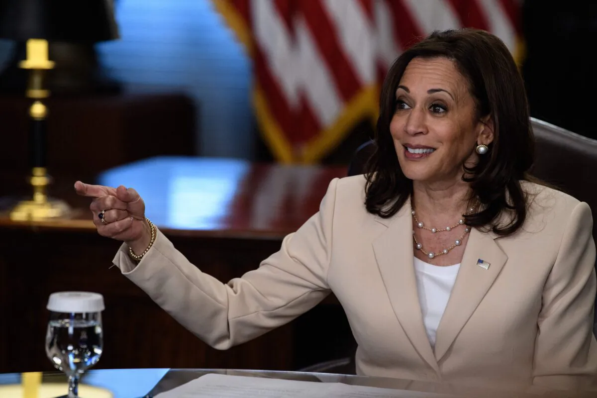 U.S. Vice President Kamala Harris speaks with poll workers and election officials in the Vice President's Ceremonial Office at the Eisenhower Executive Office Building in Washington on July 21, 2021. (Nicholas Kamm/AFP via Getty Images)