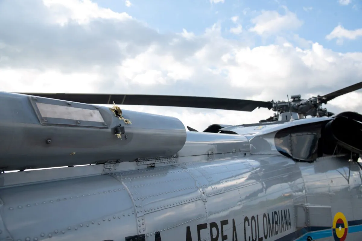 The mark of a projectile impact is seen on a helicopter that Colombian President Ivan Duque was traveling in, after it suffered an attack during an overflight in Cucuta, Colombia, on June 25, 2021. (Colombia Presidency/Handout via Reuters)