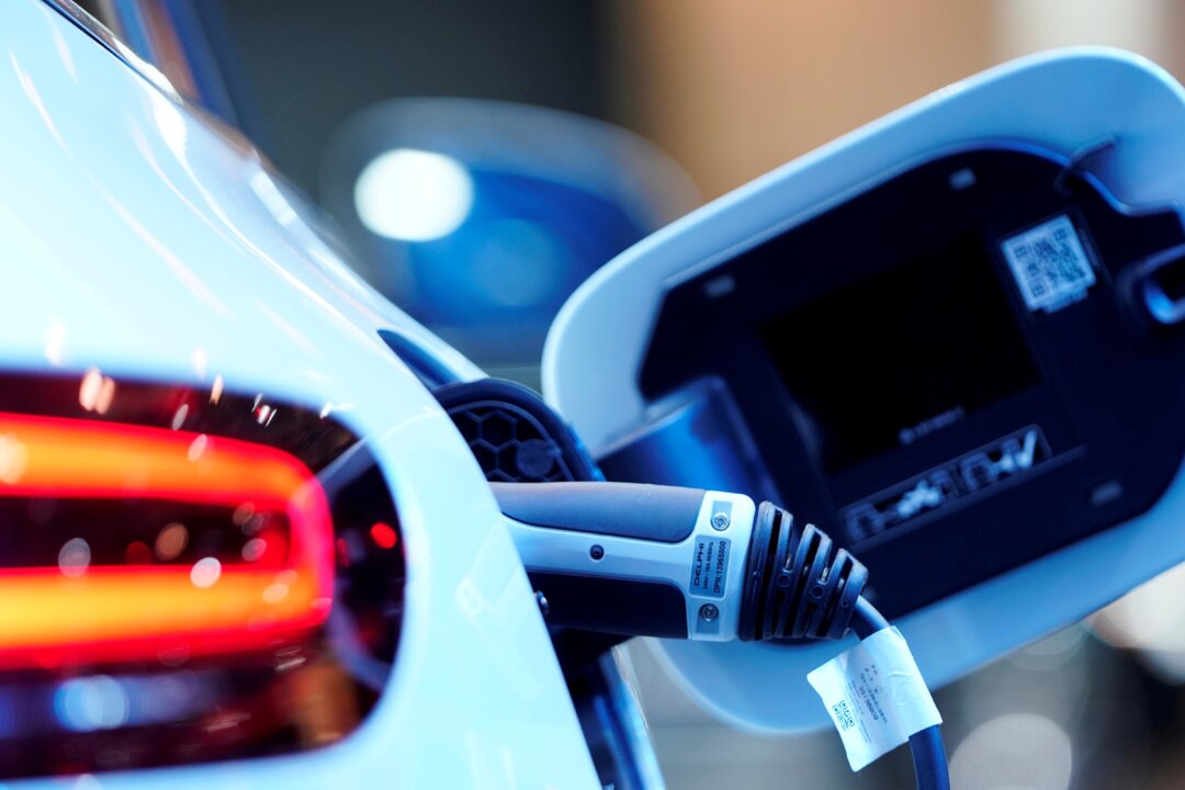 A charging port on a Mercedes Benz EQC 400 4Matic electric vehicle at the Canadian International AutoShow in Toronto, Ontario, Canada, on Feb. 13, 2019. (Mark Blinch/Reuters)