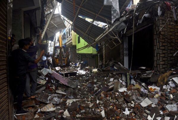 collapsed-building-india-rainfall
