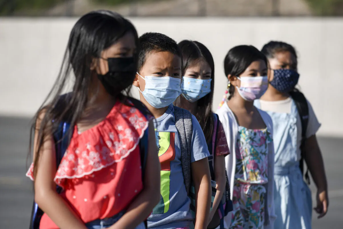 Masked students at an elementary school in Chula Vista, Calif., on July 21, 2021. (Denis Poroy/AP Photo)