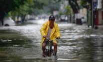 Philippines Evacuates Thousands as Monsoon Rains Flood Manila, Provinces