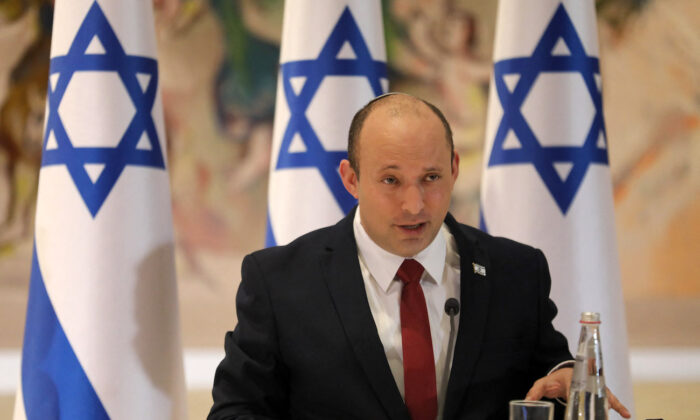 Israeli Prime Minister Naftali Bennett chairs the weekly cabinet meeting at the Knesset in Jerusalem on July 19, 2021. (Gil Cohen-Magen/Pool/ AFP via Getty Images)