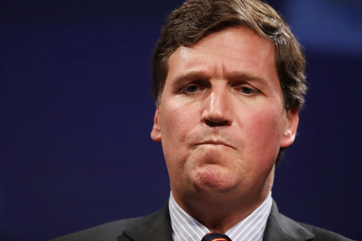 Then-Fox News host Tucker Carlson takes part in a discussion in Washington, on March 29, 2019. (Chip Somodevilla/Getty Images)