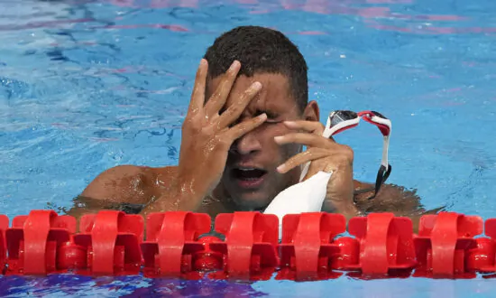 Tunisian Teen Wins Surprise Olympic Swimming Gold