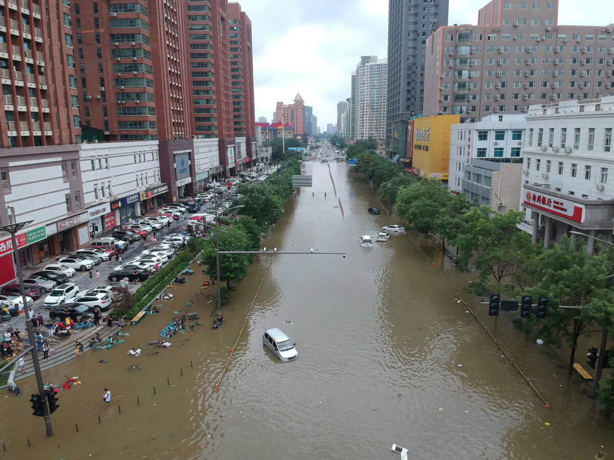 An aerial view shows a flooded road section in Zhengzhou, Henan Province, China, on July 21, 2021. (China Daily via Reuters)