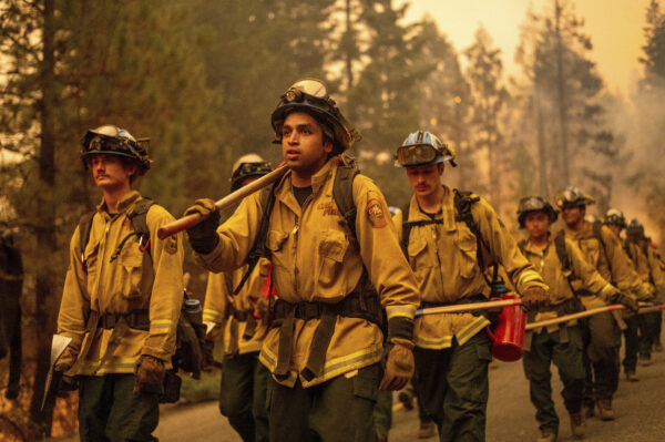 Cal Fire firefighters battle the Dixie Fire