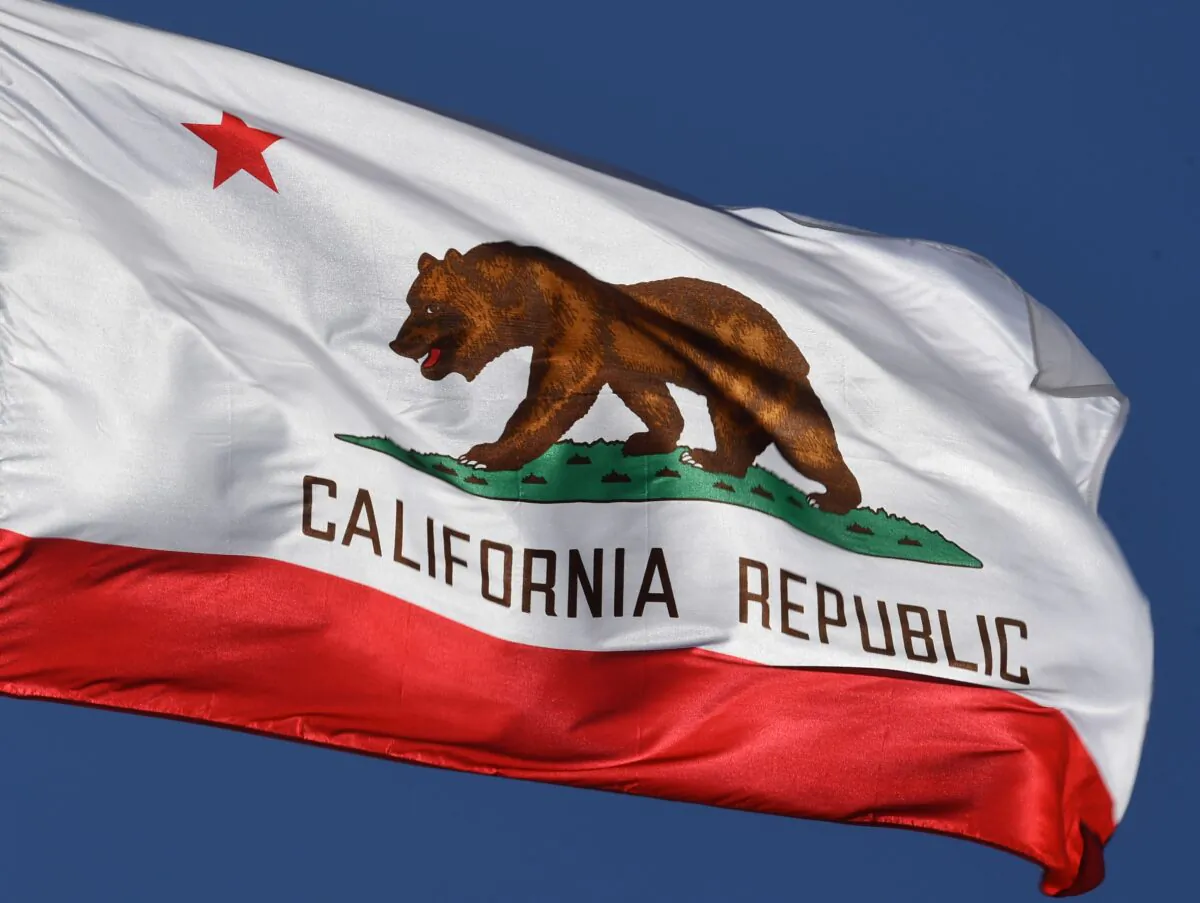 The California State flag flies outside City Hall, in Los Angeles, Calif., on Jan. 27, 2017. (Mark Ralston/AFP via Getty Images)