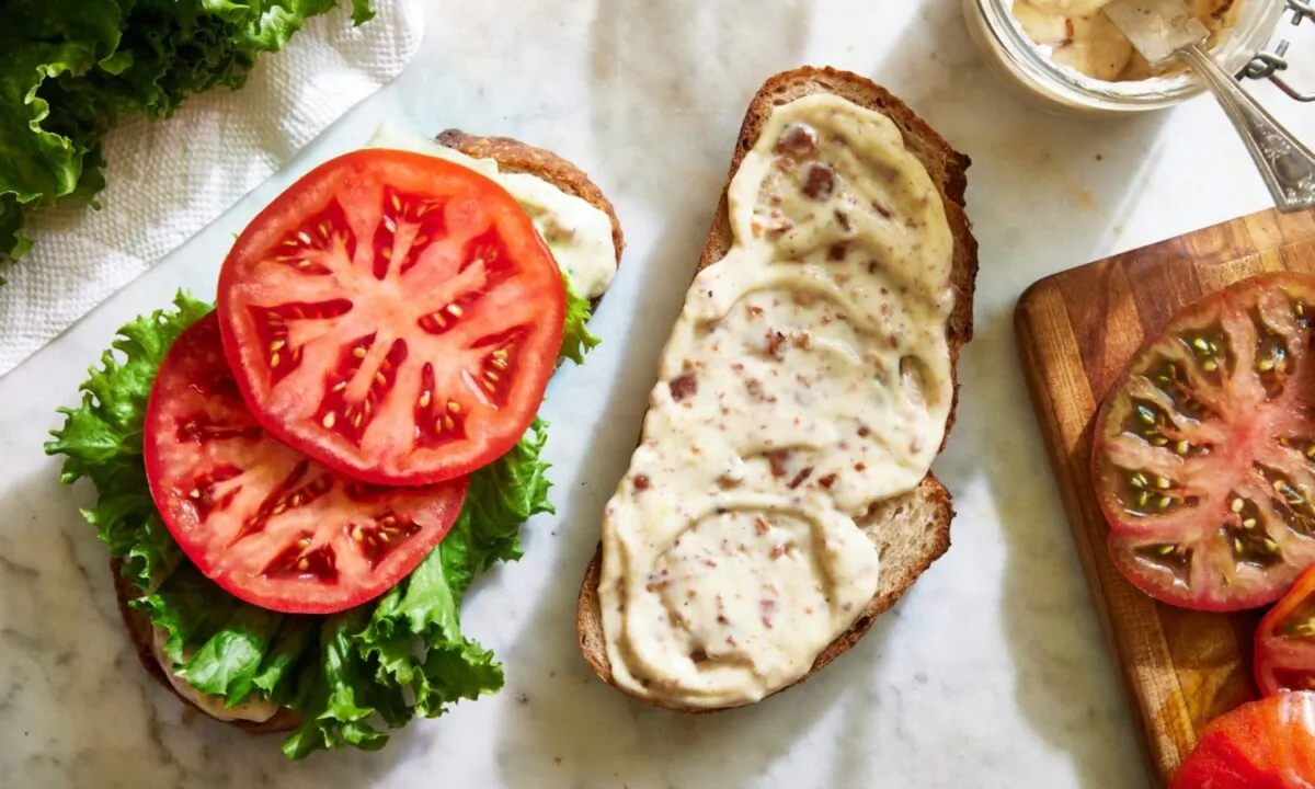 Spread bacon mayo onto two pieces of toast and top with sliced tomato and lettuce for an almost-instant BLT. (Tara Donne/TNS)