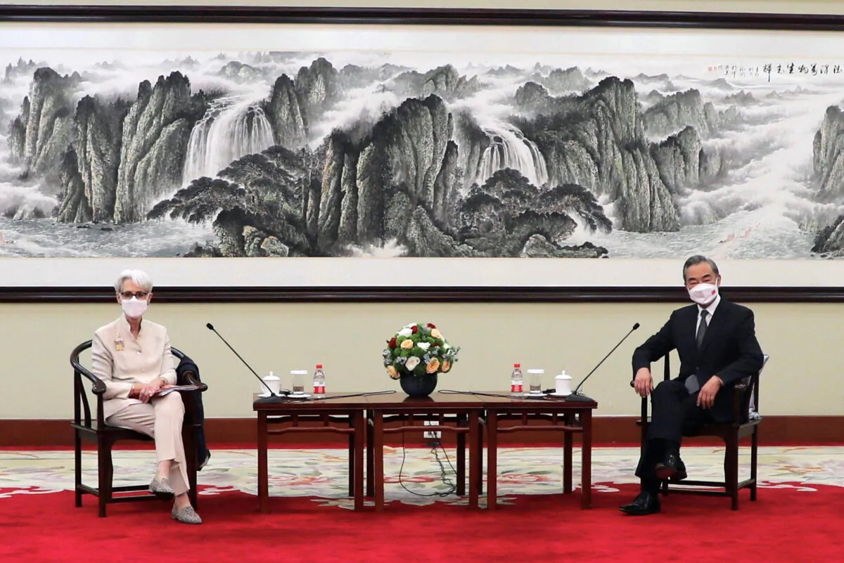 U.S. Deputy Secretary of State Wendy Sherman meets Chinese State Councilor and Foreign Minister Wang Yi in Tianjin, China, on July 26, 2021. (U.S. Department of State/Handout via Reuters)