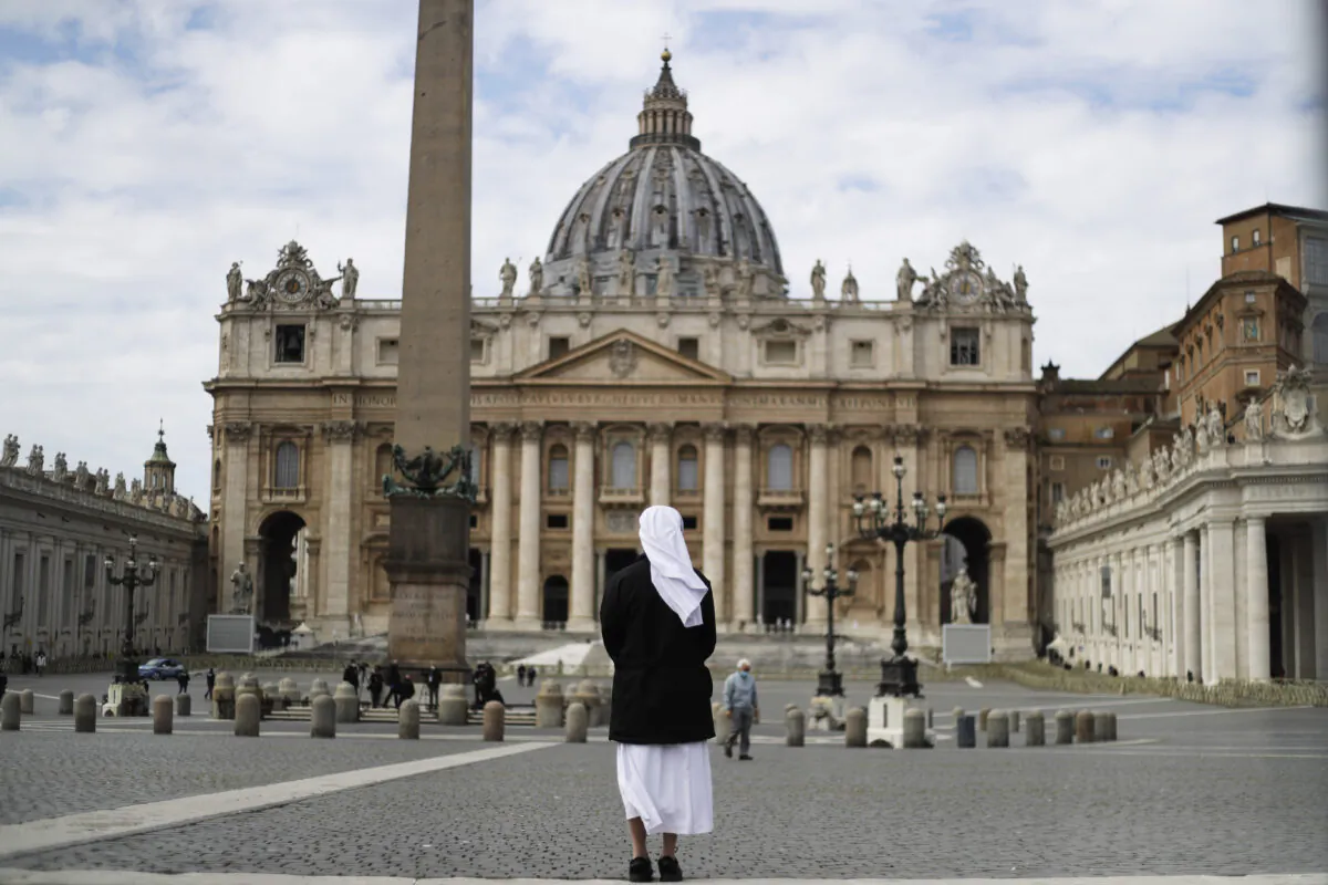 A nun stands in St. Peter's Square at the Vatican, on March 21, 2021. (Gregorio Borgia/AP Photo)
