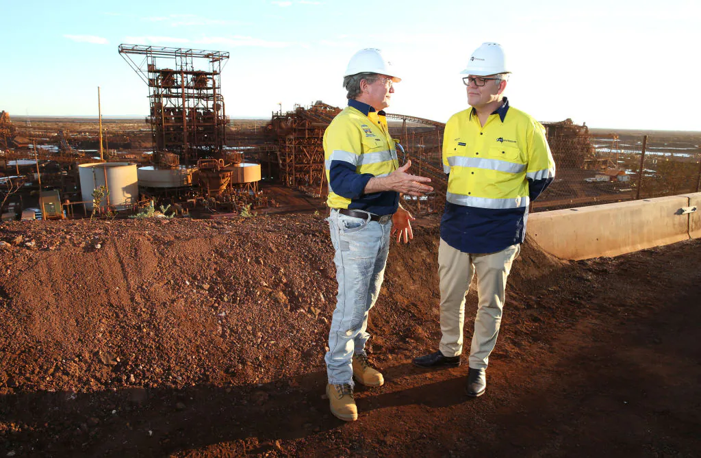 Australian Prime Minister Scott Morrison (R) tours Fortescue Metals Group's Christmas Creek mining operations with Fortescue Metals Group CEO Andrew Forrest (L) in Karratha, Western Australia, on April 15, 2021. (Justin Benson-Cooper/The West Australian - Pool/Getty Images)