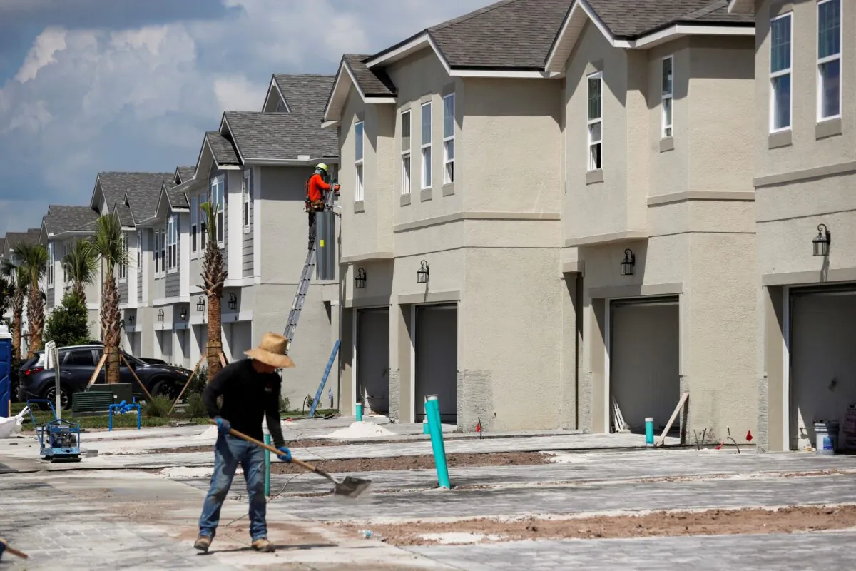 A carpenter works on building new townhomes in Tampa, Fla., on May 5, 2021. (Octavio Jones/REUTERS)