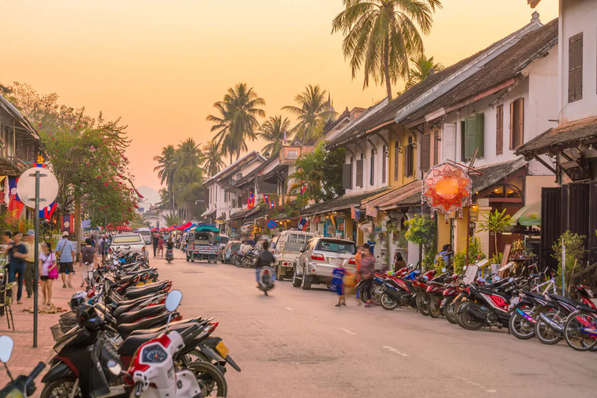 A street in old town Luang Prabang at sunset. (f11photo/Shutterstock)