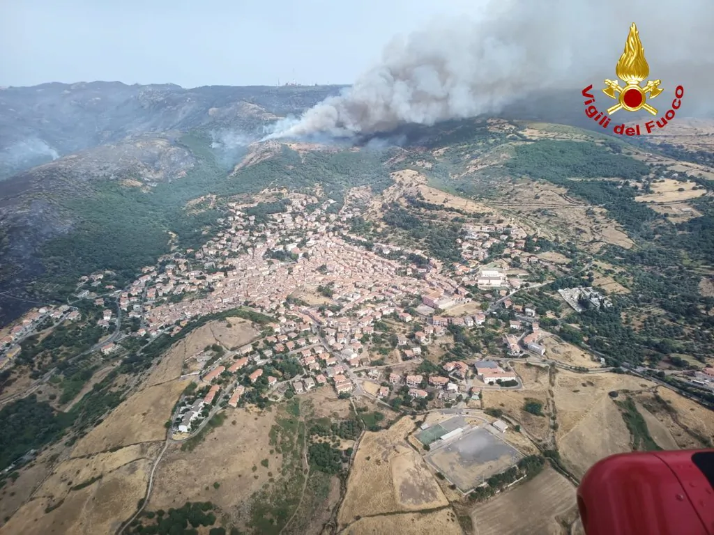 An aerial view from a helicopter shows a large wildfire that broke out near Santu Lussurgiu, Sardinia, Italy, on July 25, 2021. (Vigili del Fuoco/Handout via Reuters)
