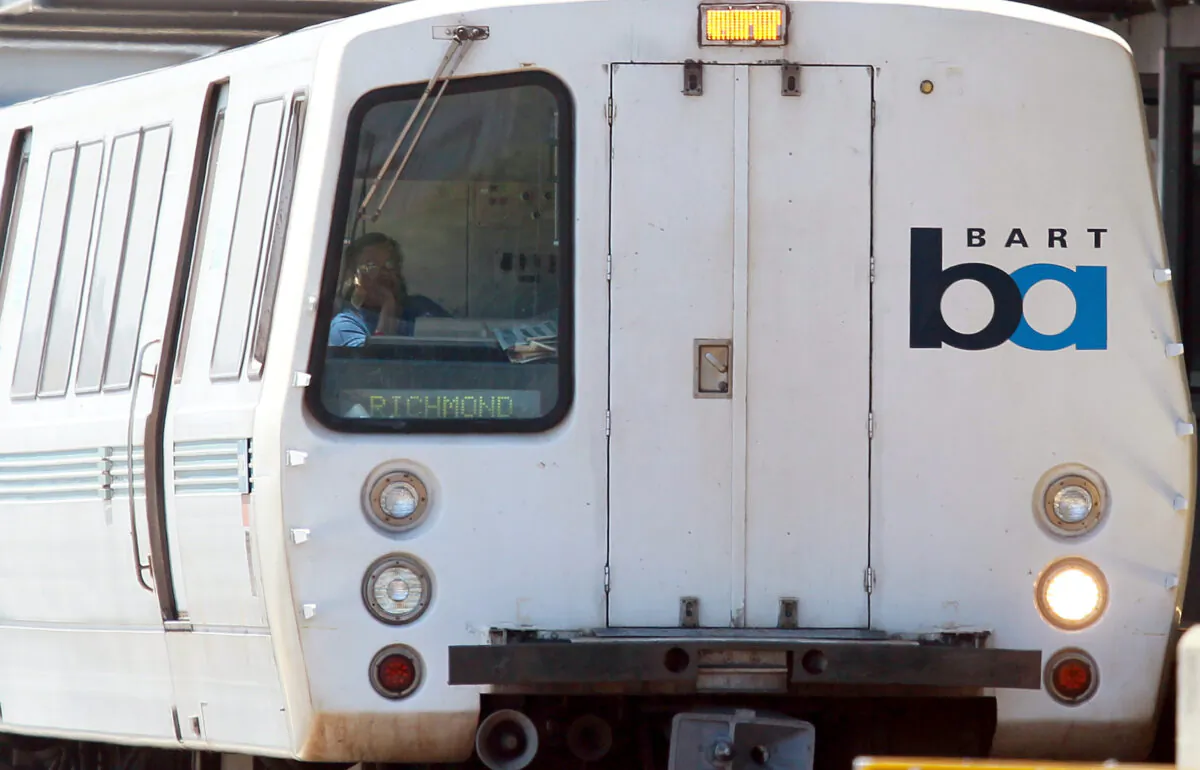 A Bay Area Rapid Transit (BART) train operator waits for passengers to enter the train at the Daly City station in Daly City, California on Aug. 15, 2011. (Justin Sullivan/Getty Images)