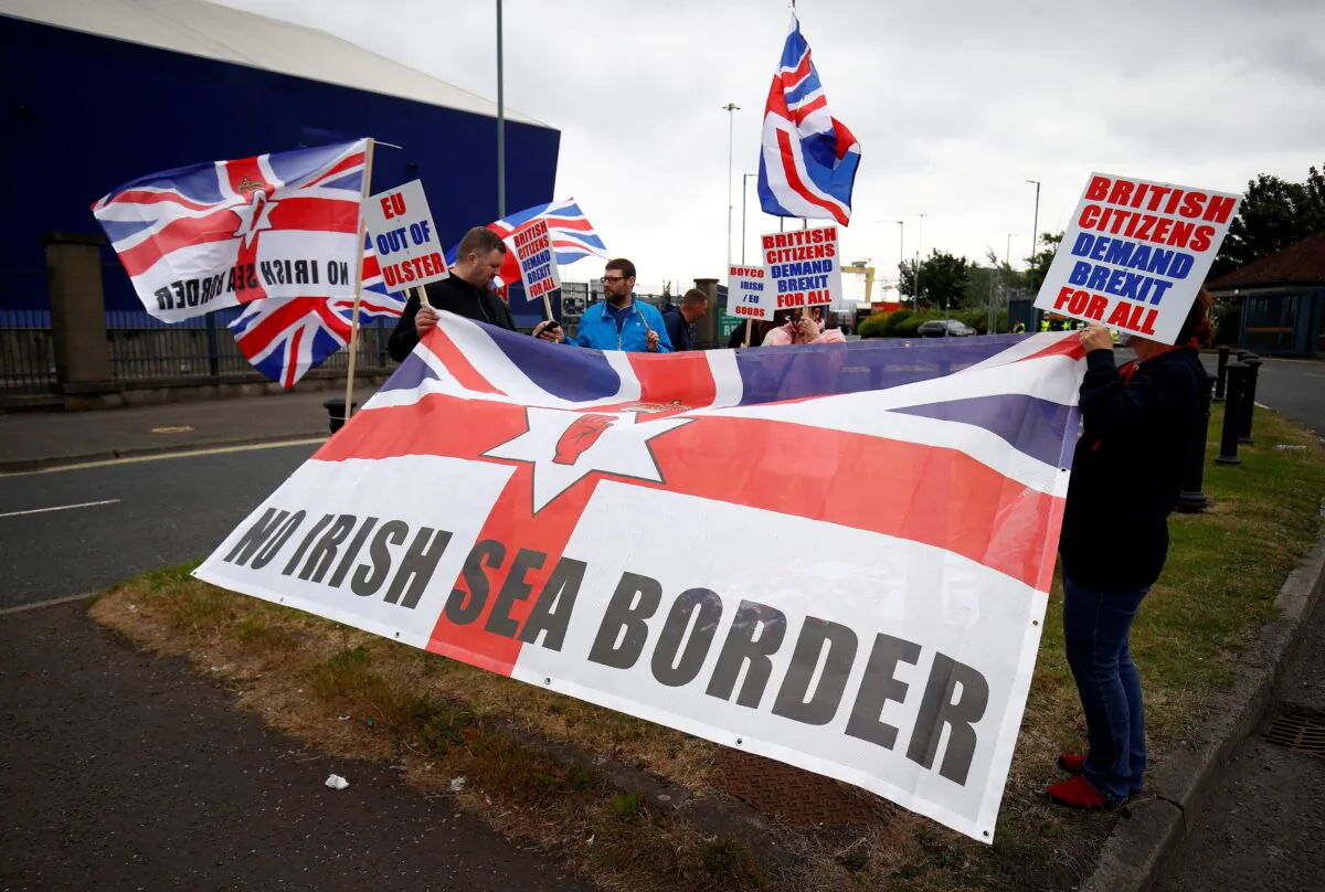 Loyalists protest against the Northern Ireland Brexit protocol at Belfast Harbour Estate, in Belfast, Northern Ireland, on July 3, 2021. (Jason Cairnduff/Reuters)