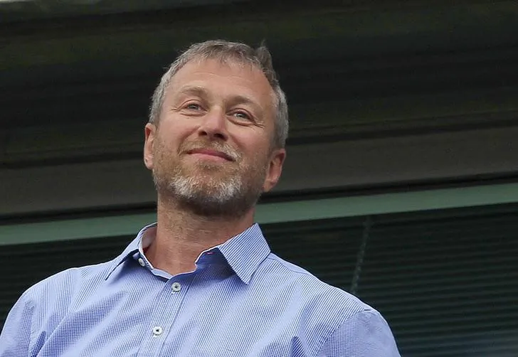 Chelsea owner Roman Abramovich watches the players do a lap of honour after their English Premier League soccer match against Blackburn Rovers at Stamford Bridge in London, on May 13, 2012. (Eddie Keogh/Reuters)