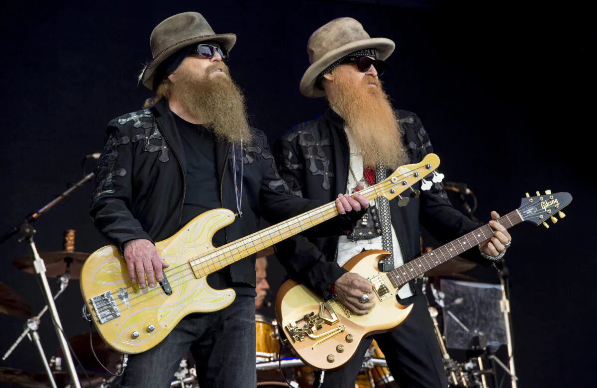 Dusty Hill (L) and Billy Gibbons (R) from U.S. rock band ZZ Top perform at the Glastonbury music festival in Somerset, England, on June 24, 2016. (Jonathan Short/Invision/AP)