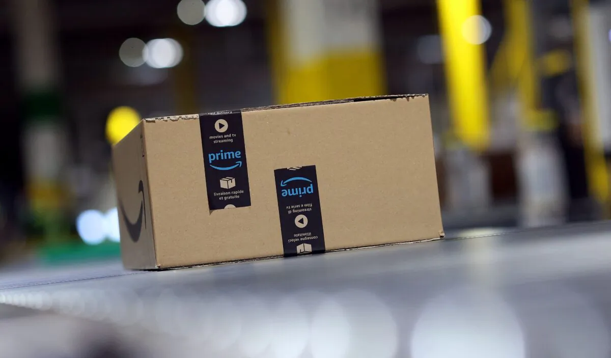 A package is transported on a conveyor belt in the Amazon logistics center in Suelzetal, eastern Germany, on May 12, 2021. (Ronny Hartmann/AFP via Getty Images)