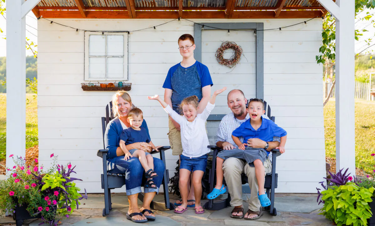 The Miller family: Lisa and Marlin (seated), and their children. (Landon Troyer/Plain Values)