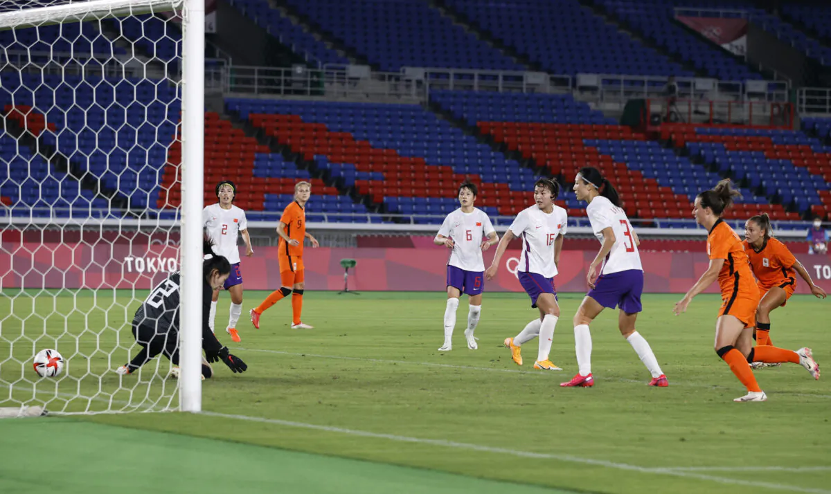 Tokyo 2020 Olympics, Soccer Football, Women, Group F, Netherlands v China. Lieke Martens of the Netherlands scores their sixth goal past Peng Shimeng of China in the International Stadium Yokohama, Yokohama, Japan, on July 27, 2021. (Phil Noble/Reuters)