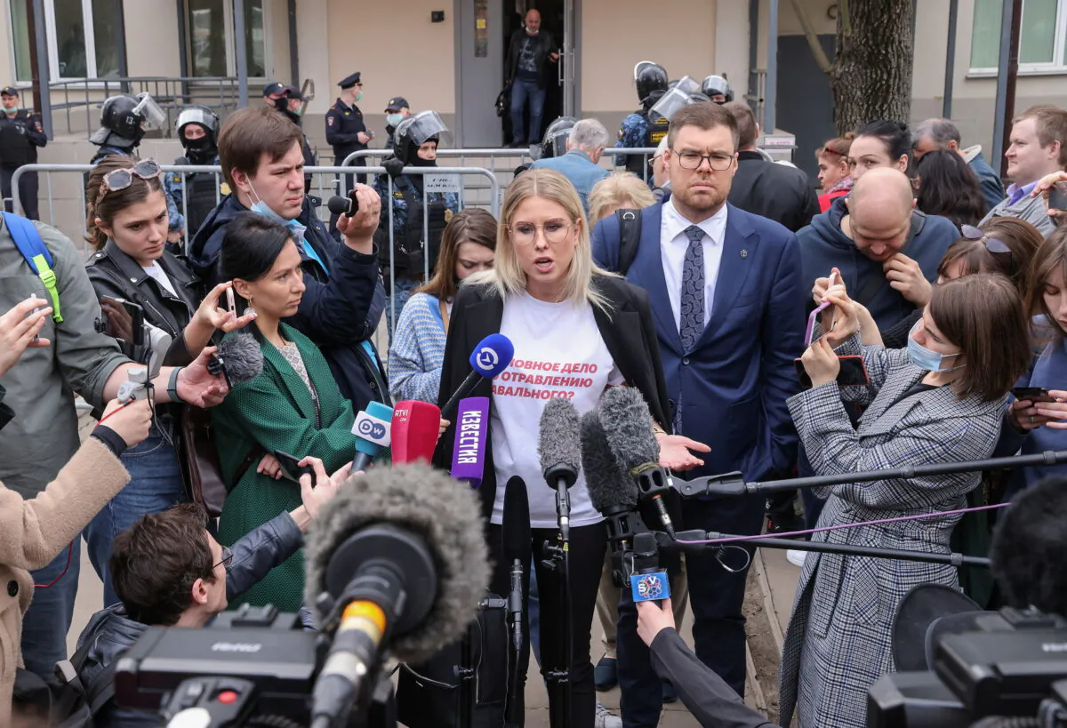 Lyubov Sobol, a Russian opposition figure and a close ally of Kremlin critic Alexei Navalny, speaks with journalists after a court hearing in Moscow, Russia, on April 15, 2021. (Tatyana Makeyeva/Reuters)