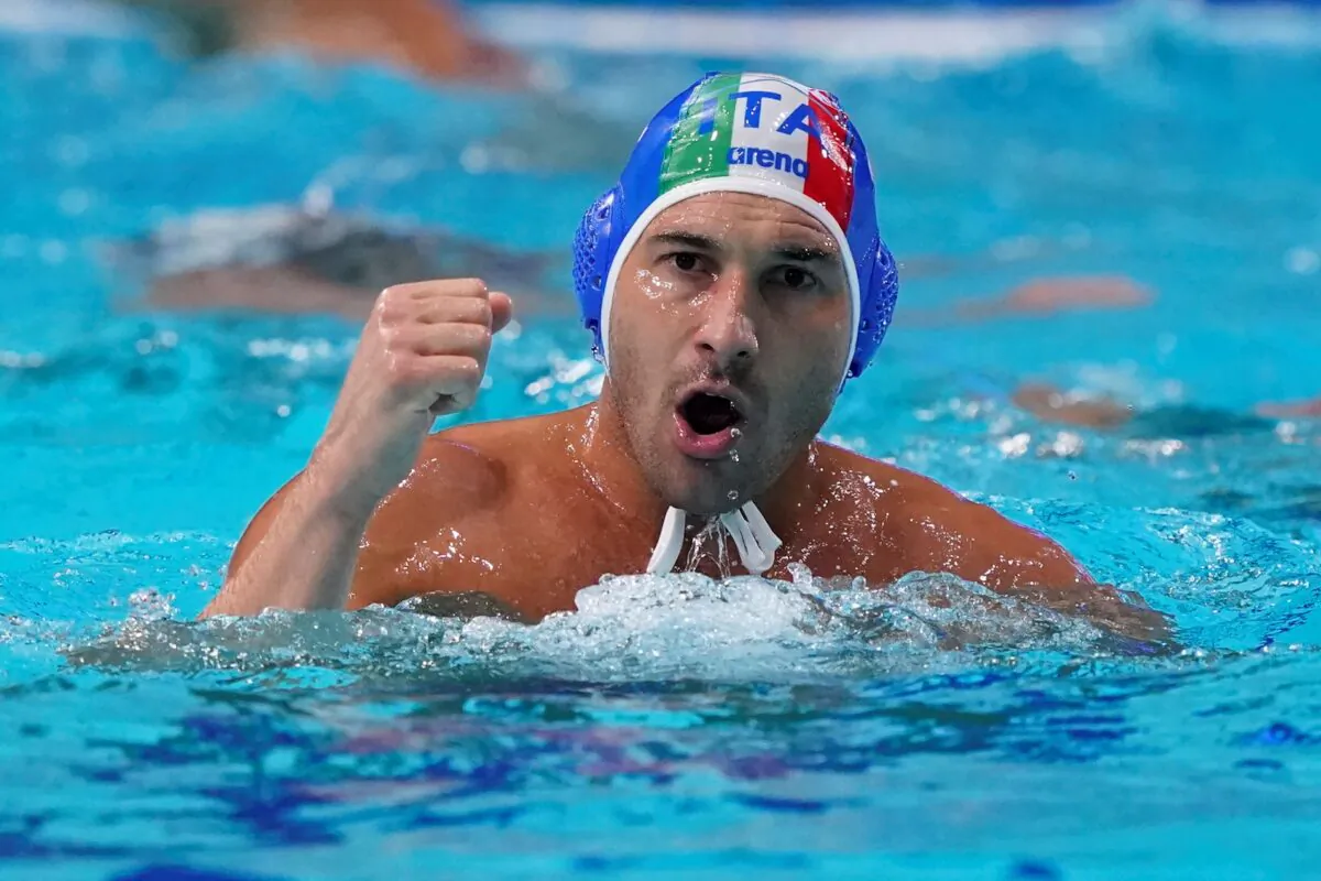 Italy's Pietro Figlioli celebrates after a score against the United States during a preliminary round men's water polo match at the 2020 Summer Olympics, in Tokyo, Japan, on July 29, 2021. (Mark Humphrey/AP Photo)