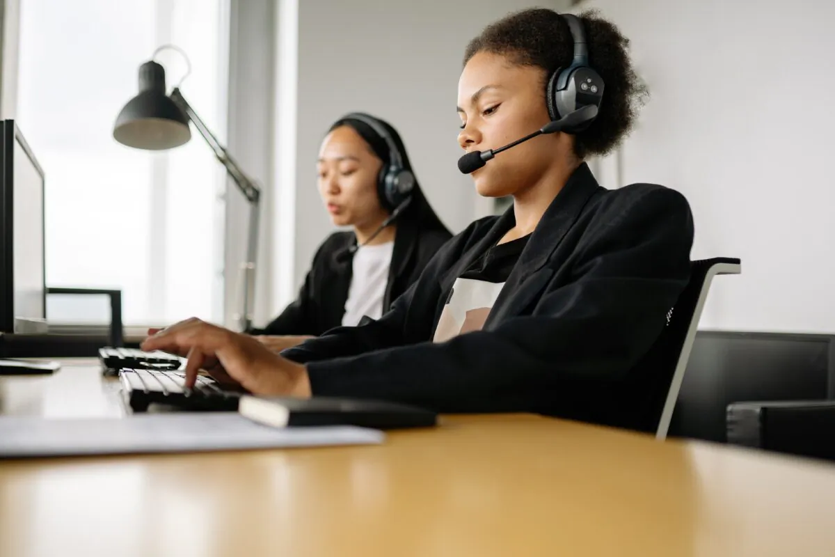 Staff providing customer service. (Yan Krukov/Pexels)