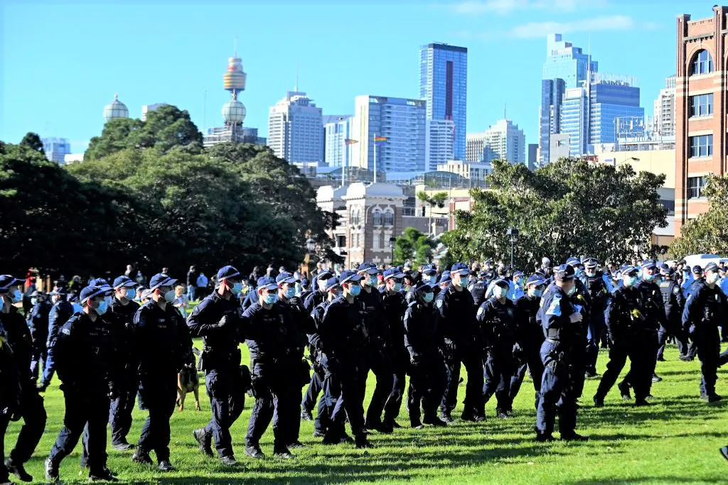 Police block the way to the marching protesters during an anti-lockdown rally in Sydney, Australia on July 24, 2021. (Steven Saphore/AFP via Getty Images)
