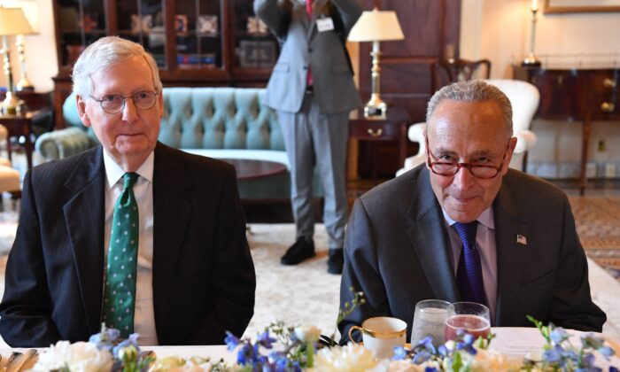 Senate Majority Leader Chuck Schumer (D-N.Y.) (R) and Senate Minority Leader Mitch McConnell (R-Ky.) meet Iraqi Prime Minister Mustafa al-Kadhemi (not shown) during a lunch at the U.S. Capitol in Washington on July 28, 2021. (Nicholas Kamm/AFP via Getty Images)