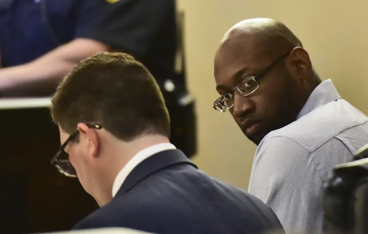 Murder defendant Otis McKane looks around the 379th District Court in San Antonio, Texas, during his capital murder trial in the shooting death of San Antonio Police Dept. officer Benjamin Marconi, on July 26, 2021. (Robin Jerstad/The San Antonio Express-News via AP)