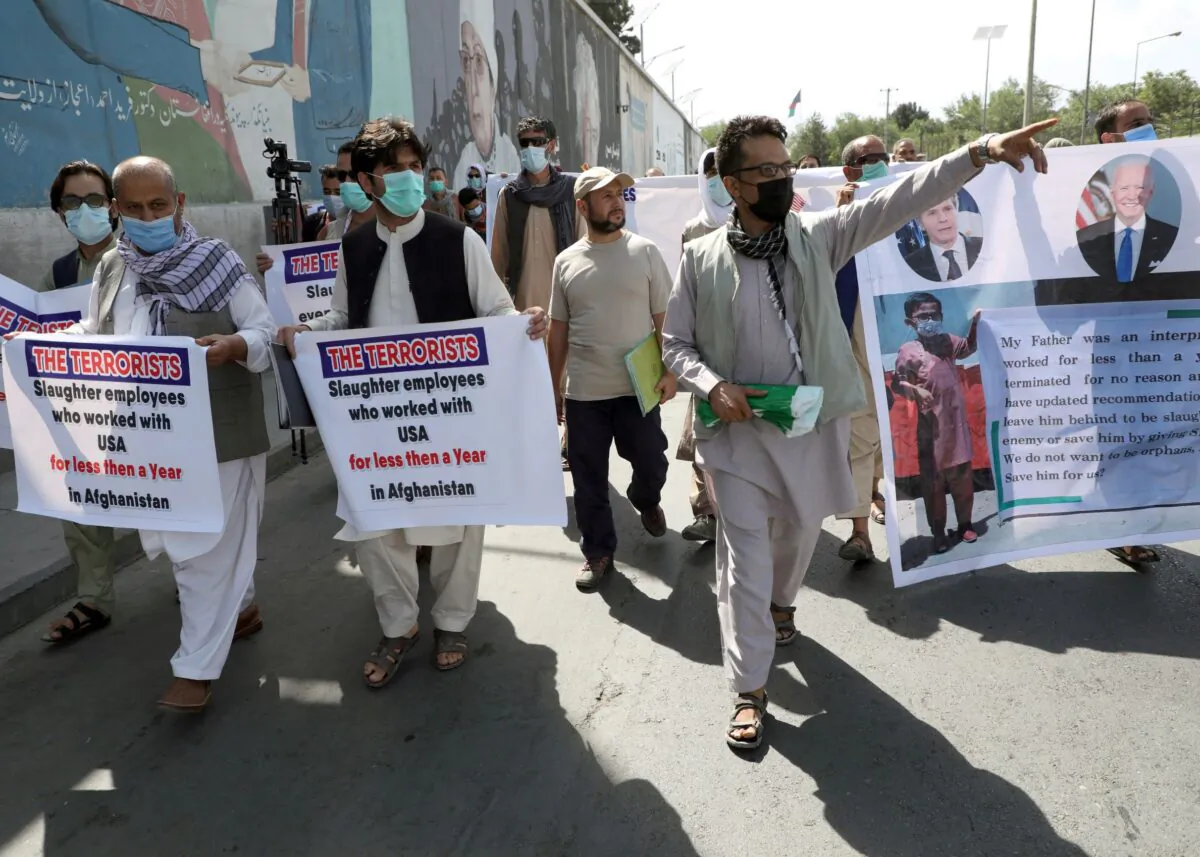Former Afghan interpreters, who worked with U.S. troops in Afghanistan, demonstrate in front of the U.S. embassy in Kabul, on June 25, 2021. (Stringer/File Photo/Reuters)