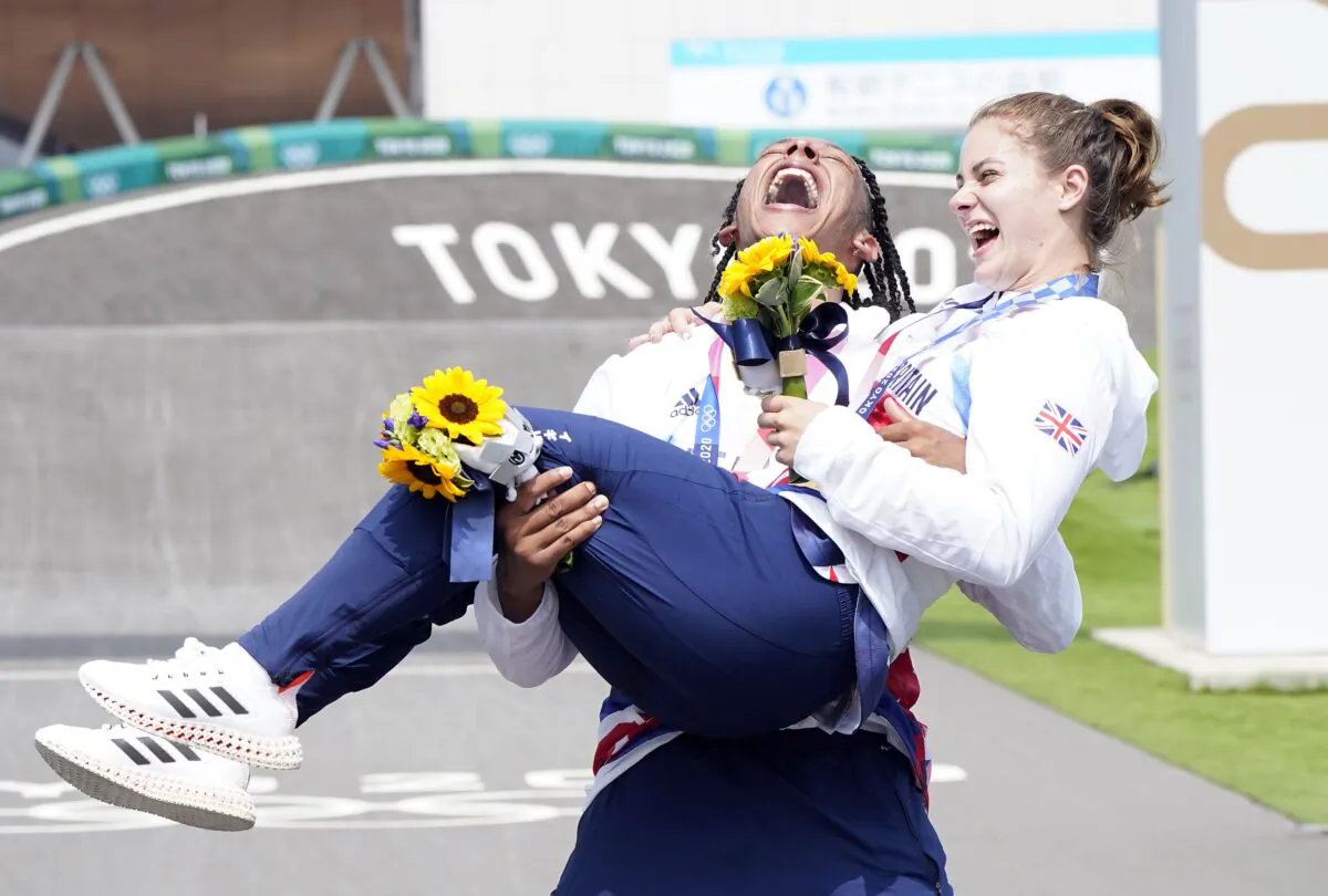Great Britain’s Beth Shriever and Kye Whyte celebrate their gold and silver BMX medals at Tokyo 2020 Olympic Games, Tokyo, Japan, on July 30 2021. (Danny Lawson/PA)