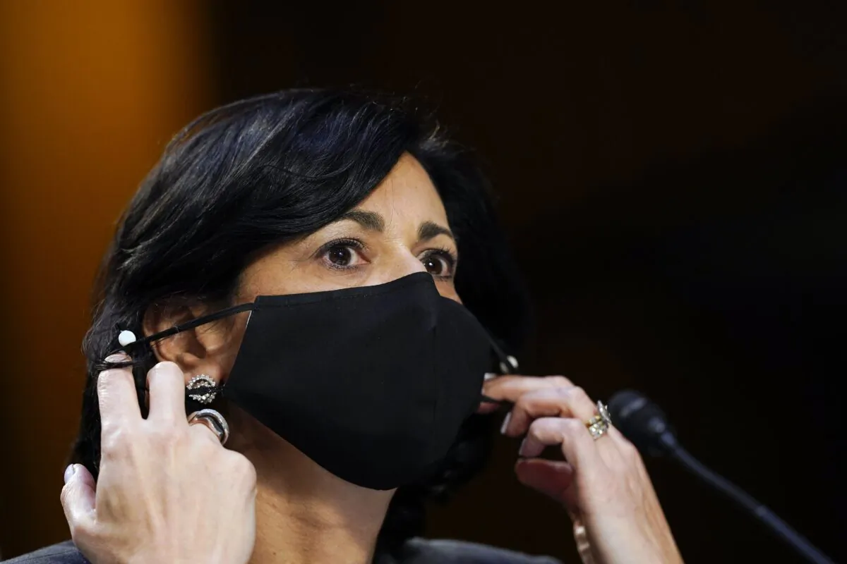Dr. Rochelle Walensky, director of the Centers for Disease Control and Prevention, adjusts her face mask during a Senate hearing in Washington on March 18, 2021. (Susan Walsh/AP Photo)