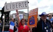 French Police Clash With Anti-Virus Pass Protesters in Paris