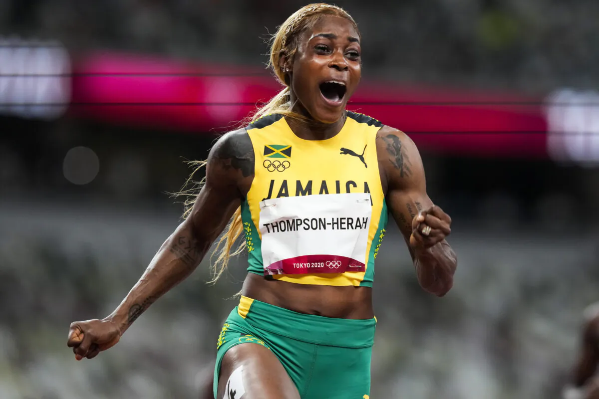 Elaine Thompson-Herah, of Jamaica, wins the women's 100-meter final at the 2020 Summer Olympics in Tokyo, July 31, 2021. (Martin Meissner/AP Photo)